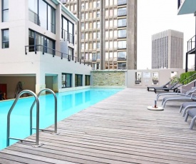 Business Hub Apartment With Rooftop Pool & Gym