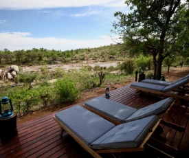 Ivory Wilderness River Rock Lodge